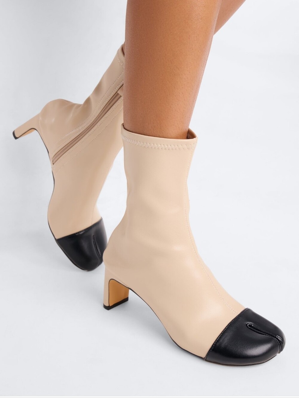 Beige and Black Two-Tone Mid-Heel Sock Boot